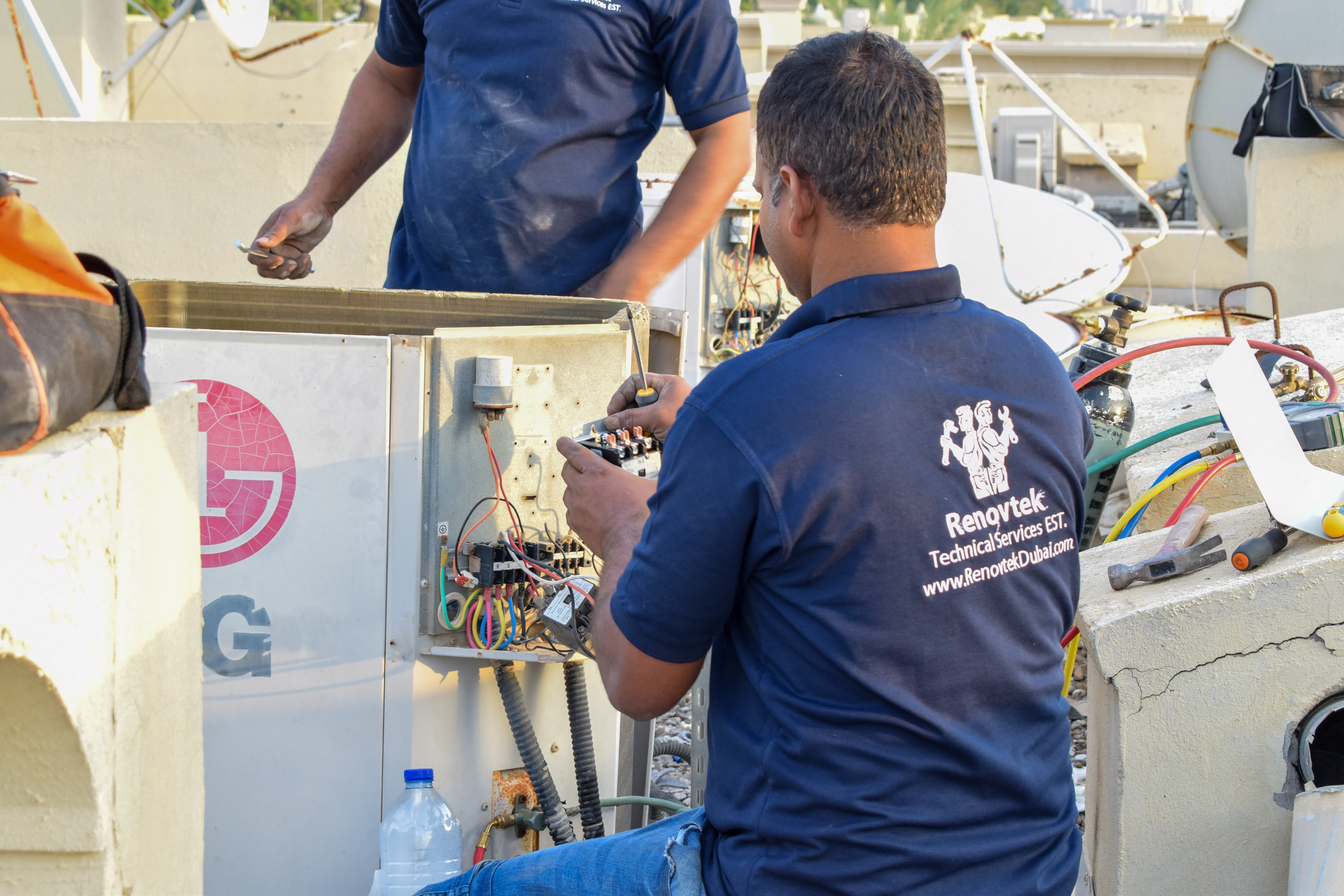 "checking the electrical wirings of outdoor unit AC"