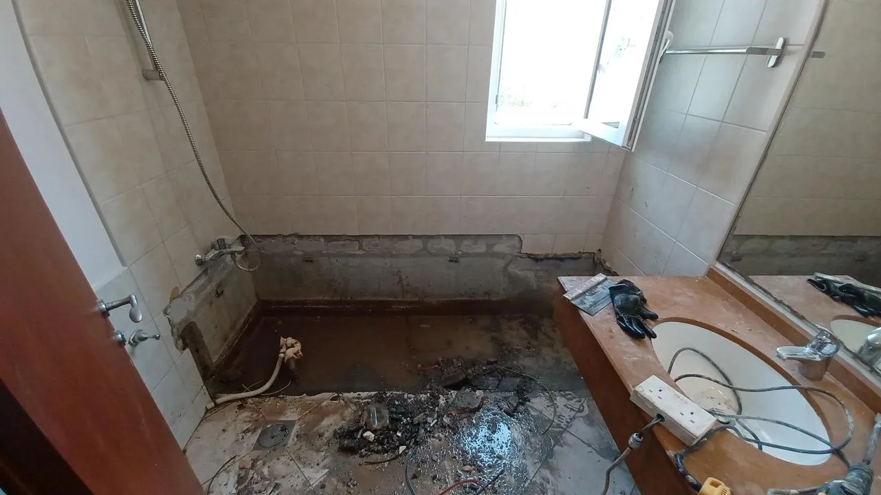 Notice the Accumulated water under the bathtub