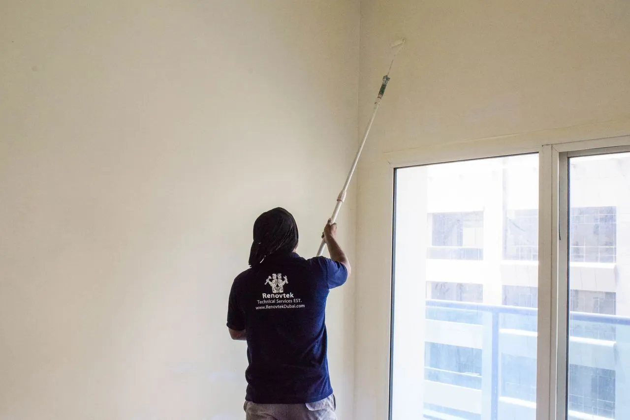 Wall painting using a water base paint
