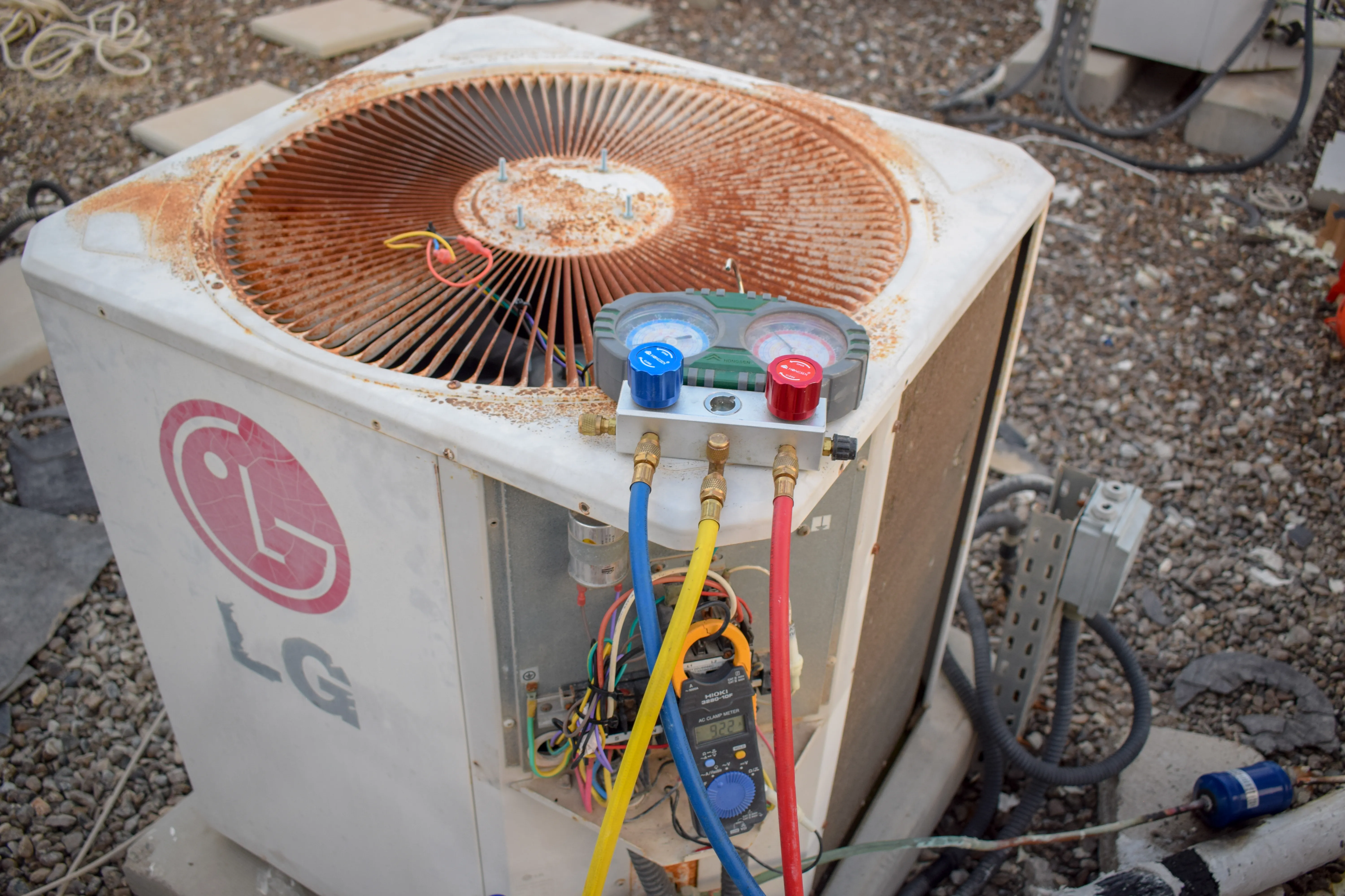 "Checking AC refrigeration gas level"